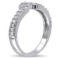 Zaručnički prsten s obrisom od bijelog zlata od 10 karata koji je dizajnirala tvrtka A. M. N. M. s bijelim safirom