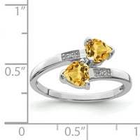 Prsten u obliku srca izrađen je od čistog srebra s rodijem, citrinom i dijamantom. Težina dragulja-0,76 karata
